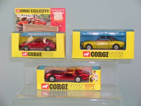 A group of three window boxed Corgi toy Saloons, t