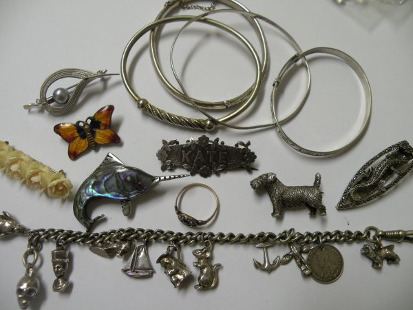 A collection of jewellery to include; a silver wi