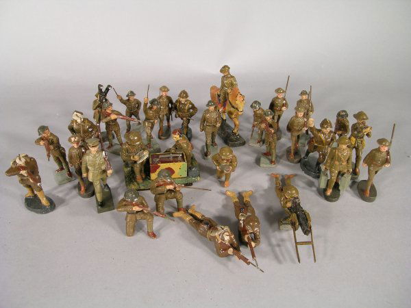 Elastolin British troops WW1/WWII, 1930's compris: Elastolin British troops WW1/WWII, 1930's comprising mounted officer, morse code operators, ammunition carrier, running, firing and prone troops, trench periscope operator, machine gunner, some damage