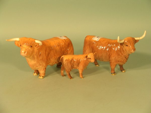 A three piece Beswick Highland Cattle group