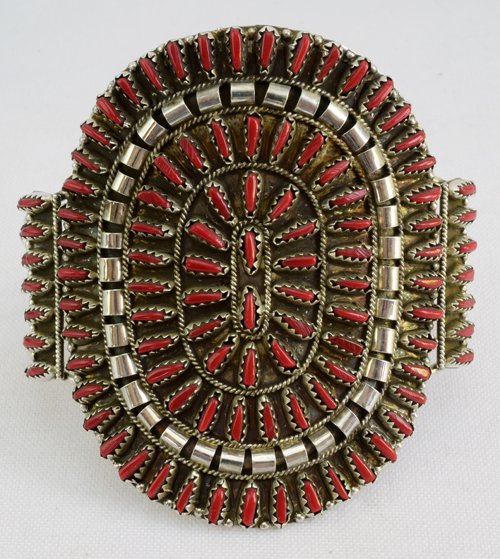 Native American Sterling Silver Coral Needlepoint Cuff: Measures 2.75 inches from top to bottom and done in the Needlepoint style with Coral. The inside measures 5.5 inches with a gap of 1.25 inches. Stunning bracelet marked Sterling and Hallmarked "BJB".