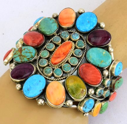 David & Alice Lister Spiny Oyster Collector Bracelet: Measures 3 inches from top to bottom this piece is all of the colors of the Southwest. It has different colors of Spiny Oyster and Natural Turquoise Throughout. The inside measures 5 5/8 inches with a