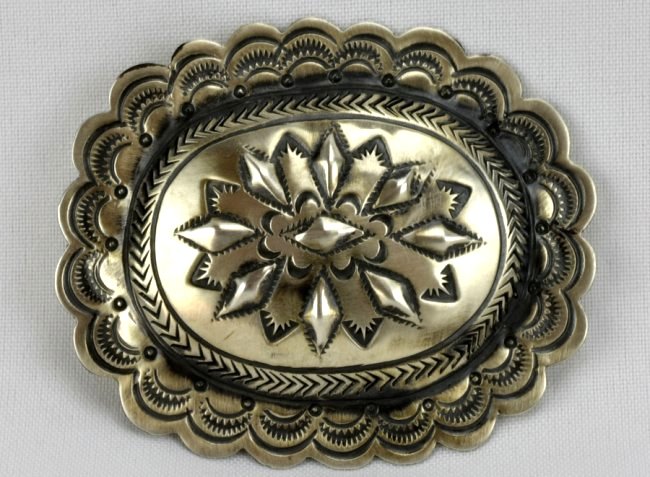 Navajo Carson Blackgoat Sterling Silver Belt Buckle: Measures 3 x 2.5 inches and done in a Stamped and Repousse design. Marked Sterling and Signed "Carson B". Weighs 29.8 Grams. Native American, Navajo, Southwestern Indian Jewelry.