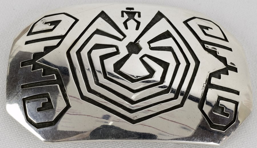 Hopi Sterling Silver Man in a Maze Belt Buckle: Measures 3 x 2 inches with Overlay design of "Man in a Maze" on the top. Stamped Sterling and has a Hopi marking {sign} on the back. Weighs 39.7 Grams. Native American, Navajo, Southwestern Indian Jew