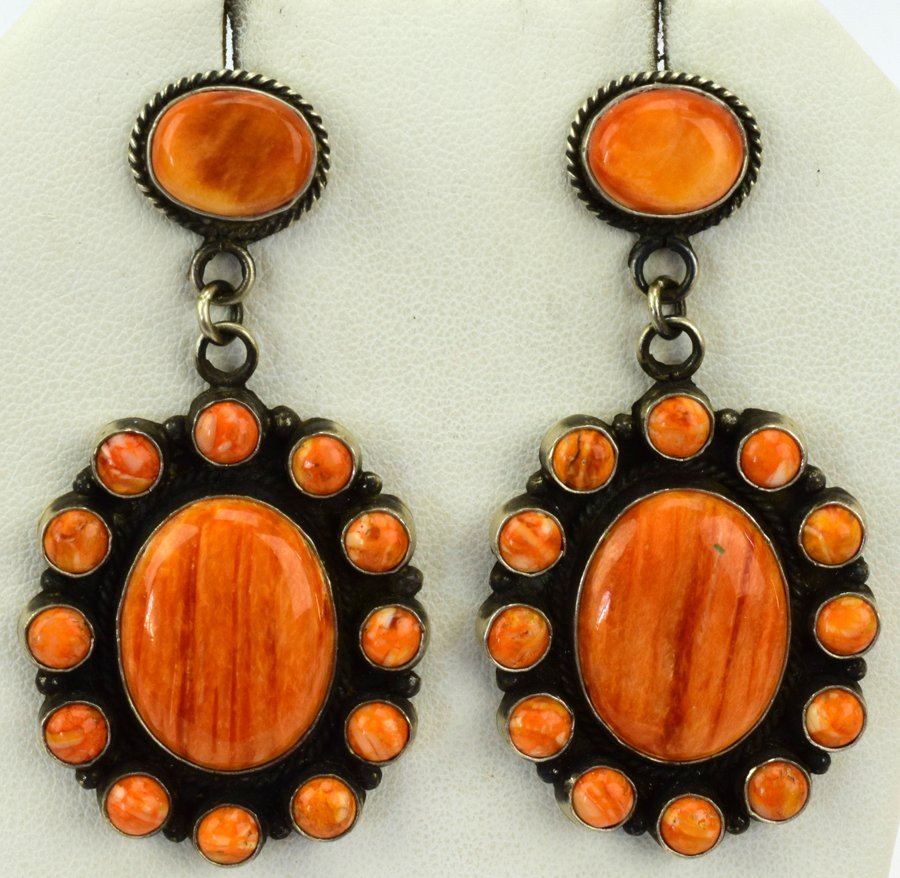 Jennifer Begay Sterling Silver Spiny Oyster Earrings: for pierced ears these earrings measure 2.5 inches in length x 1.25 inches wide. They have beautiful Spiny Oyster stones surrounded with halo pieces. Marked Sterling and Hallmarked "JB". Weigh 27.6 Gr