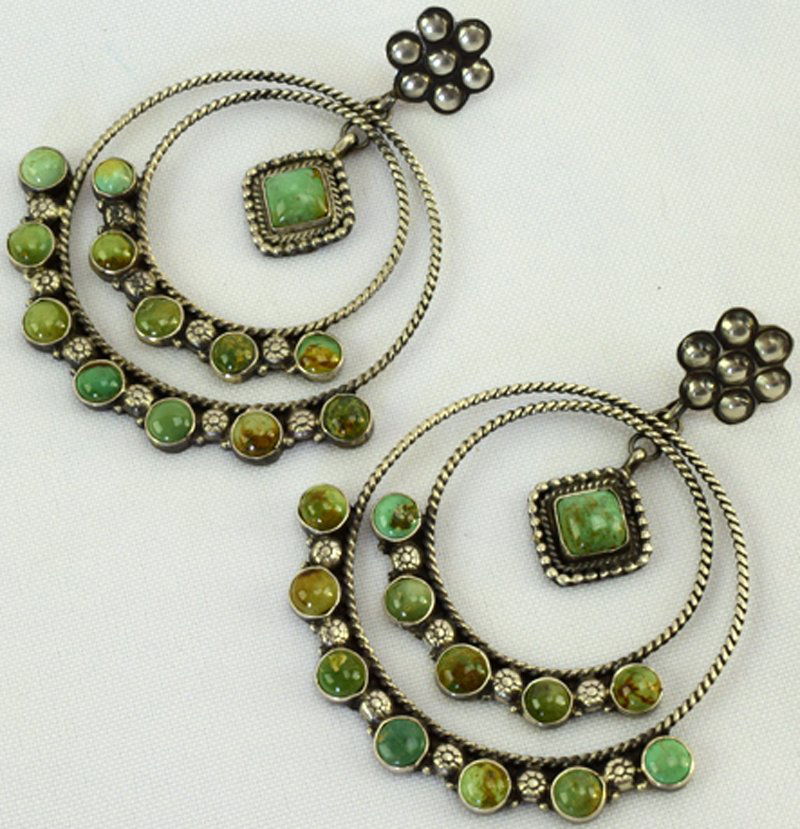 Annie Hoskie Large Sterling Turquoise Earrings: For pierced ears these earrings measure 3 1/8 inches x 2 3/8 inches wide. They are uniquely done with a Green Turquoise Center stone and two surrounding hoops with matching green turquoise stones acce