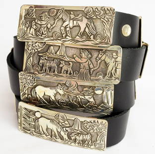 Navajo Sterling StoryTeller Concho Belt-Lloyd Becenti: A Wonderful example of Storyteller Design. The belt has 9 sterling Storyteller conchos and a sterling Storyteller belt buckle. Each Storyteller concho measures 3 inches long x 1-1/ inches tall The