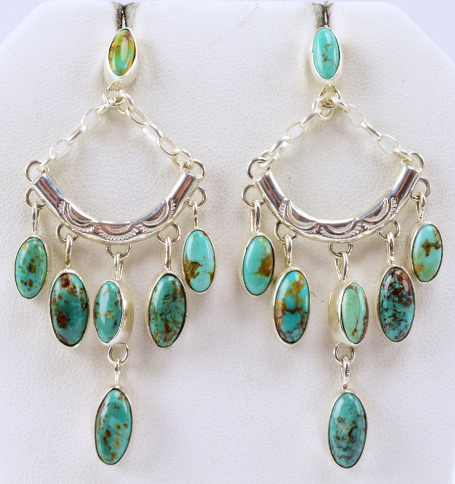 Native American Sterling Chandalier Turquoise Earrings: For pierced ears these have a lot of movement and measure 2.75 inches in length x 1 3/8 inches wide. They have Natural Blue/Green Turquoise and are done in a Chandalier Style. Stamped Sterling and wei