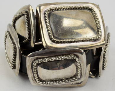 Navajo Old Pawn Vintage Sterling Concho Belt: Leather measures 43 inches in length and has 10 Heavy gauge concho pieces plus the Buckle. Each concho piece measures 2 3/8 inches wide x 1.75 inches tall. The conchos are polished and have a rope