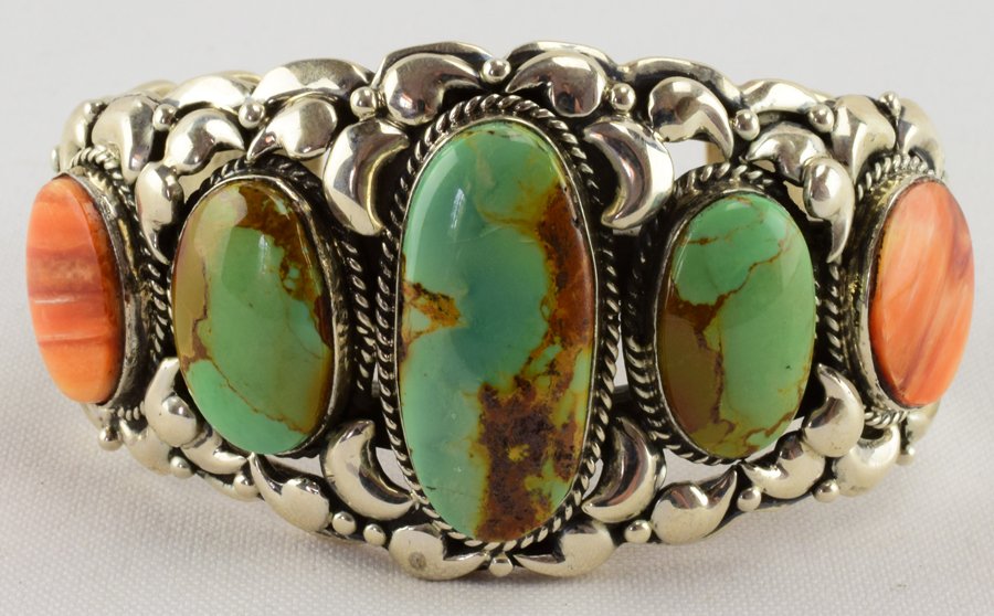 Leroy James Royston Turquoise & Spiny Oyster Bracelet: Measures 1.5 inches wide in the center this bracelet has 3 Oval Cut Natural Royston Turquoise center stones accented on the ends with a spiny oyster piece. A Very well made piece. The bracelet has bea