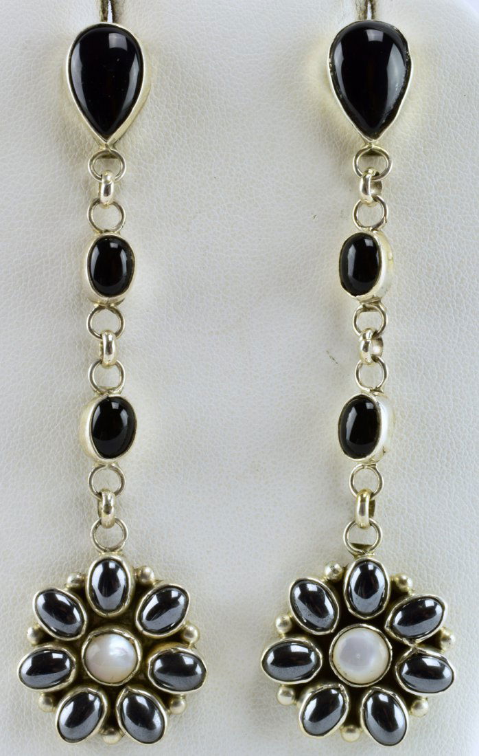Jacquline Silver Sterling Multi-Stone Earrings: For pierced ears. These earrings measure 3.5 inches in length and have a lot of movement. The portion that fits on the ear lobe is Black Onyx and drops down to a flower which is Mother of Pearl and He
