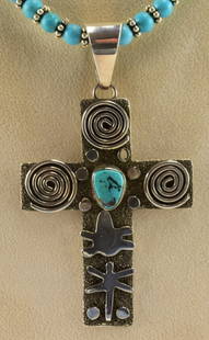 Navajo, Alex Sanchez Petroglyph Cross Pendant w/Turq.: This auction is for the Pendant Only - Not the chain Measuring 3.5 inches from Bale to bottom and 2 inches wide this pendant is done in the traditional Petroglyph Style that this artist is famous for.