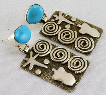 Navajo, Alex Sanchez Petroglyph Earrings w/Turq.: For pierced ears these earrings measure 2 inches long x 1 inch wide. As most of this artist's items these are done in a Petroglyph style with a Natural Turquoise Stone at the top. Completely