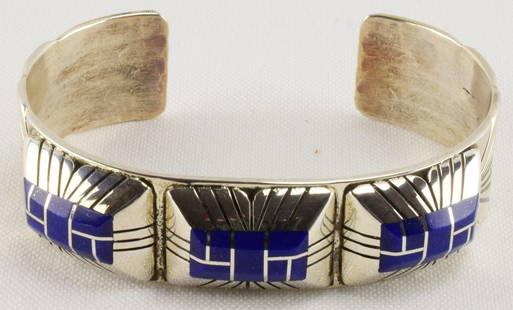 Chester Benally Sterling Lapis Inaly Bracelet-Vintage: When we purchase this item we were told that this artist is not making items for re-sale now. This piece is approx. 20+ years old. It measures 5/8 inch wide all around. The top has three stations