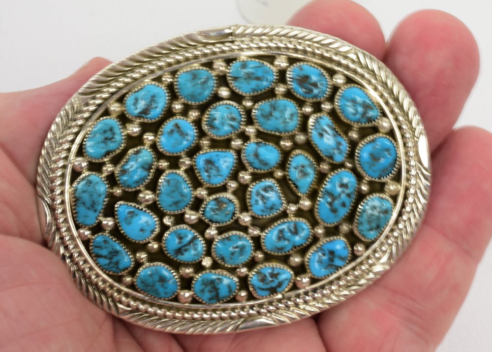 M. Hale, Sterling Sleeping Beauty Nugget Belt Buckle: Measures 3 x 2.5 inches this Belt Buckle has Natural Sleeping Beauty stones set throughout the entire top. It has a 1.75 inch keepter. Accented with a bead and rope frame. This piece is Stamped Sterli