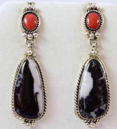 Leroy James Sterling White Buffalo & Coral Drop Earring: For pierced ears these measure 2.5 inches in length. They have a Mediterranean Coral piece at the top and the bottom is made of White Buffalo Turquoise. The earrings have a Sterling Bead Frame. Stampe