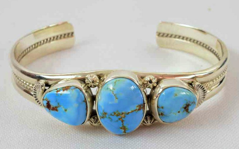 Thomas Francisco Sterling Golden Hills 3 Stone Cuff: Measuring 3/4 inch wide with three Golden Hills Turquoise Center Stones accented with bead and rope design. A well made piece that measures 5.75 inches inside plus a gap of 1.25 inches. Stamped Sterli