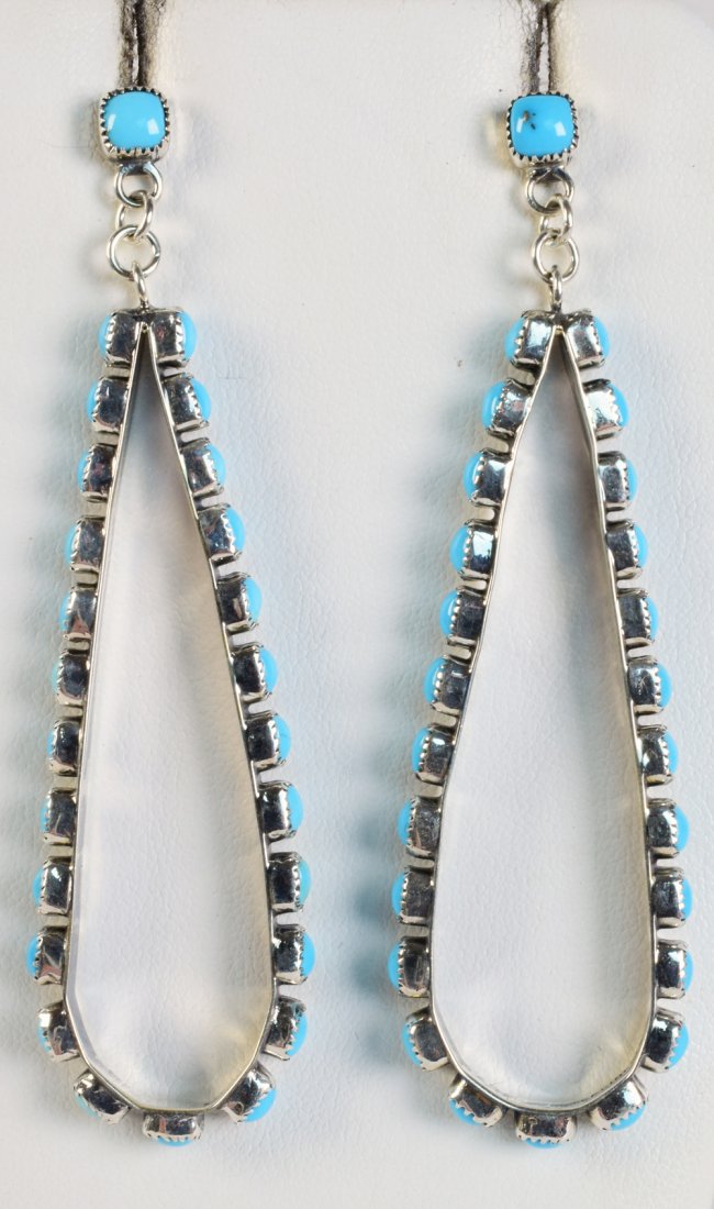 Anthony Skeets Sterling Sleeping Beauty Turq. Earrings: This artist always thinks out of the box with his styles and these are no exception. The earrings are pear shape and have the stones set on the sides. For pierced ears and measure 3.25 inches in lengt