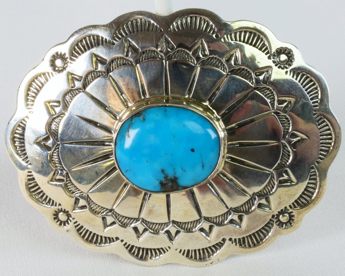 Chimeny Butte Campitos Turquoise Belt Buckle: Measuring 2.75 inches long x 2.25 inches wide this bely buckle has a Natural Campitos Turquoise Center stone with stamped Design. Stamped Sterling and Signed. Weighs 46.1 Grams. Native American, Navaj