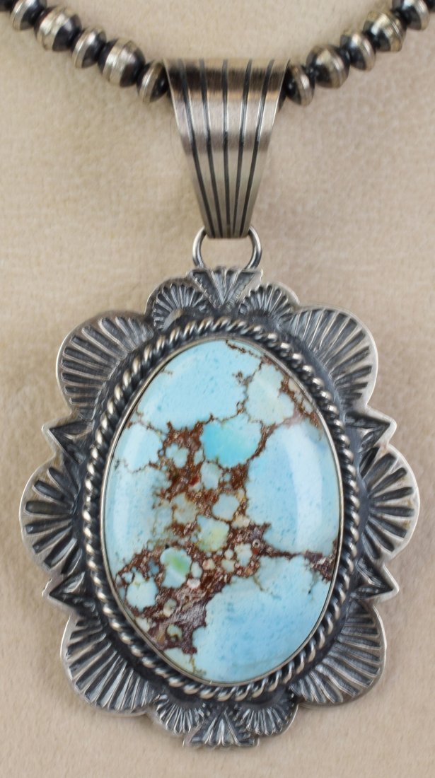 Mary Ann Spencer Golden Hills Turquoise Pendant: Pendant Only - Measures 2.75 inches long x 1.75 inches wide. This Pendant has a Nice large Oval Golden Hills Turquoise Center Stone that is accented with a Matt Sterling Stamped Frame. Stamped Sterlin