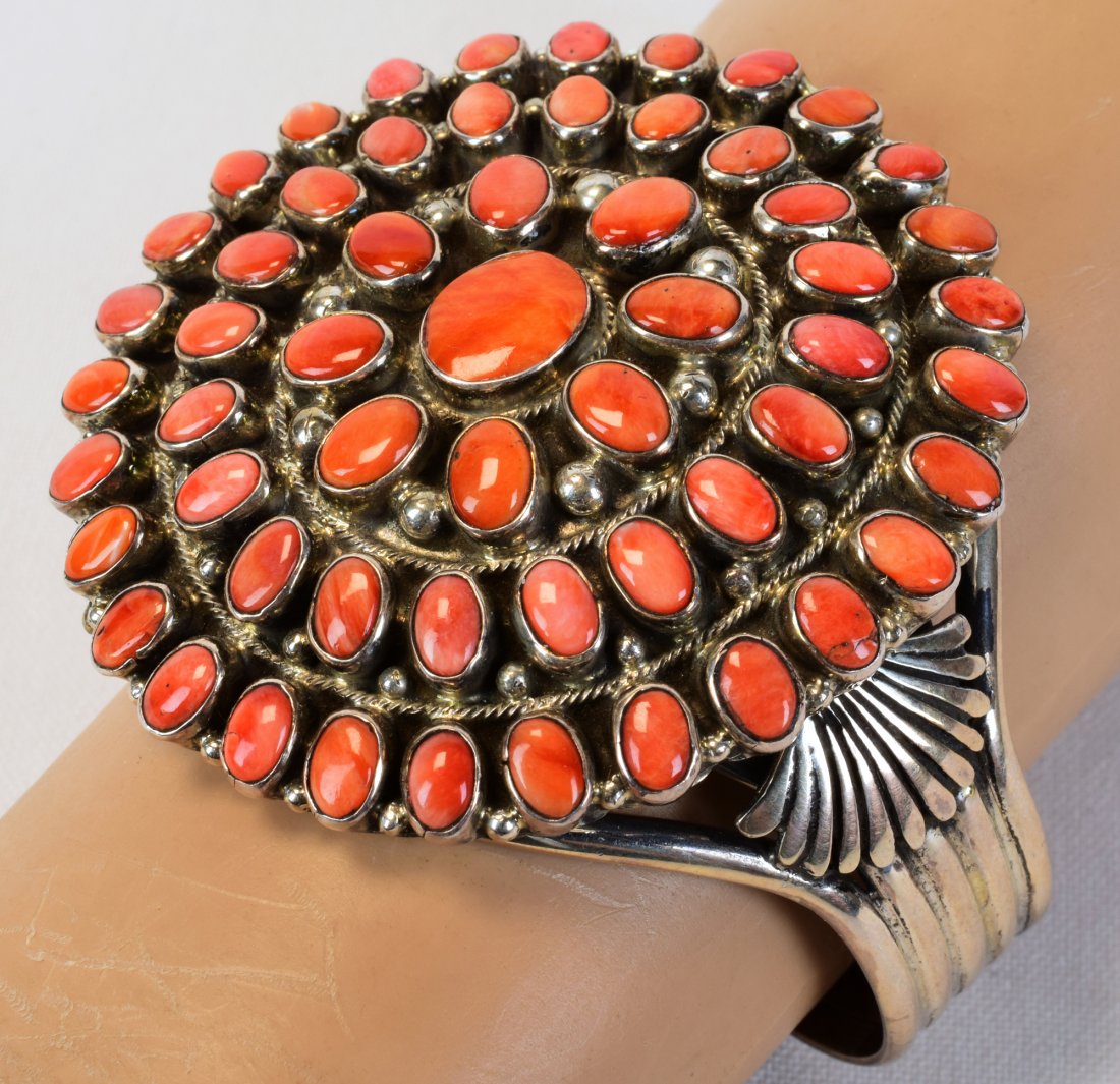 Geraldine James Sterling Spiny Oyster Cluster Cuff: Measures 2.5 inches in diameter across the top. This piece is very well made with the Spiny Oyster pieces all matched, Polished and set in a bezel Setting. The top of the bracelet is domed and is acce