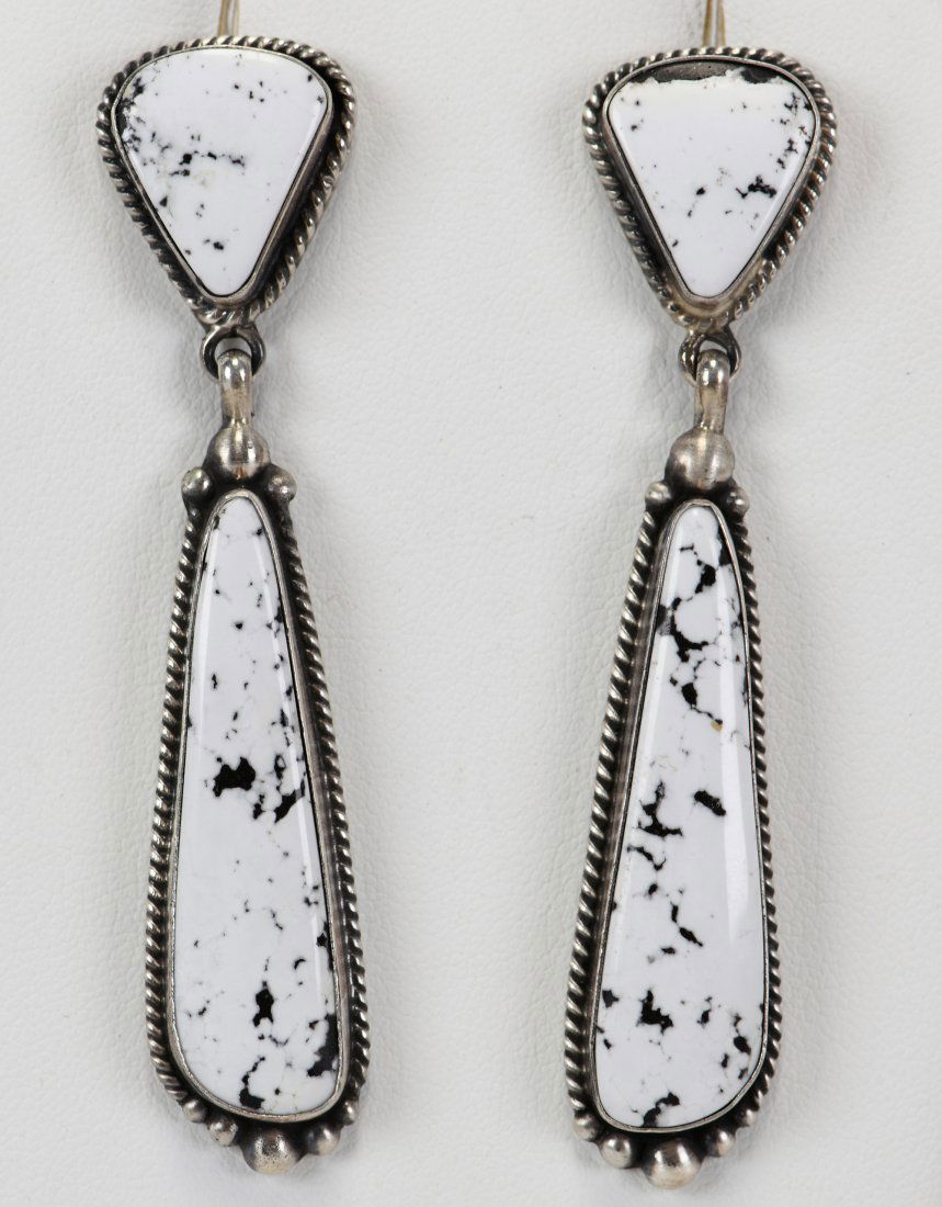 Elouise Kee Sterling White Buffalo Turquoise Earrings: For pierced Ears these earrings are long and daring. They measure 3 inches long x 5/8 inch wide. They have a Stone that sits on the ear lobe and then drop into a long dangling piece. Stamped Sterling