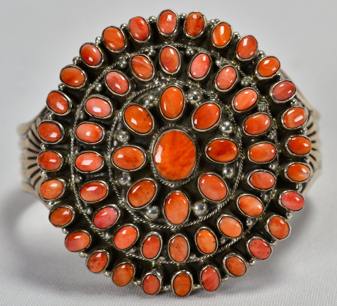 Geraldine James Sterling Spiny Oyster Cluster Cuff: Measures 2.5 inches in diameter across the top. This piece is very well made with the Spiny Oyster pieces all matched, Polished and set in a bezel Setting. The top of the bracelet is domed and is acce
