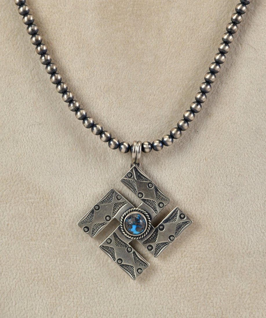 Bo Reeves Sterling Silver Whirling Log Pendant Necklace: Sterling Silver| Bo Reeves Sterling Silver Whirling Log Pendant Necklace| Sterling Silver & Genuine Turquoise| Chain Measures 24" long and has 3 mm beads| Pendant measures 2" x 1.5"| Signed| Necklace 
