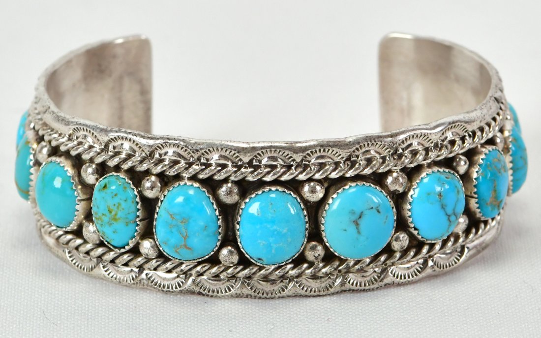 Chris Charley Sterling Silver Kingman Turquoise Cuff Bracelet: Sterling Silver| Chris Charley Sterling Silver Kingman Turquoise Cuff Bracelet| Genuine Kingman Turquoise| Inside measures 5.75"plus a gap of 1.25" - Total 7"|Face Width 1"| Signed| Weighs 51.7 Grams|