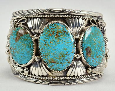 Mike Thomas, Jr. Heavy Gauge Spiderweb Turquoise 3 Stone Bracelet: Sterling Silver| Mike Thomas, Jr. Heavy Gauge Spiderweb Turquoise 3 Stone Cuff Bracelet| Genuine Spiderweb Turquoise| Inside measures 6" plus a gap of 1.25 inches - Total 7.25"| Face Width 2 1/4"|