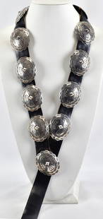 Navajo Old Pawn Sterling Silver Stamped Concho Belt: Sterling Silver| Navajo Old Pawn Sterling Silver Stamped Concho Belt| Genuine Sterling Silver| Measures 44" Long| Has 11 Concho pieces which measure 2" Tall x 2.25" wide| The Buckle also measures 2" T