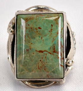 Navajo Sterling Silver Carico Lake Turquoise Men's Ring: Sterling Silver| Navajo Sterling Silver Carico Lake Turquoise Men's Ring| Genuine Carico Lake Turquoise| Measures 1.25" long x 3/4" Wide| Hallmarked "DM"| Weighs 20.7 Grams| Size 8.75| Native American