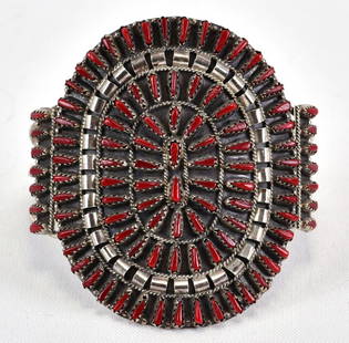 Violet Begay Sterling Silver Block Coral Needlepoint Bracelet: Sterling Silver| Violet Begay Sterling Silver Block Coral Needlepoint Bracelet| Block Coral| Inside measures 5.5" plus a gap of 1.25" - Total 6.75"| Face Width 2.75"| Hallmarked| Weighs 33.2 Grams| Na