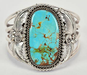 Mike Thomas, Jr. Sterling Silver Turquoise Mountain Large Bracelet: Sterling Silver| Mike Thomas, Jr. Sterling Silver Turquoise Mountain Turquoise Large Bracelet| Genuine Turquoise Mountain Turquoise| Inside measures 6" plus a gap of 1" - Total 7"| Face Width 2.25"| S