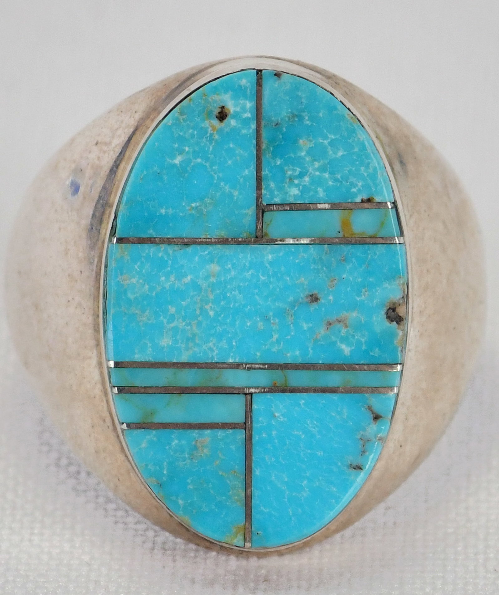 Native American Sterling Silver Kingman Turquoise Inlay Ring: Sterling Silver| Native American Sterling Silver Kingman Turquoise Inlay Ring| Genuine Kingman Turquoise| Measures 1" Long x 1/2" Wide| Hallmarked "WG"| Weighs 16.1 Grams| Size 9.5| Native American, N