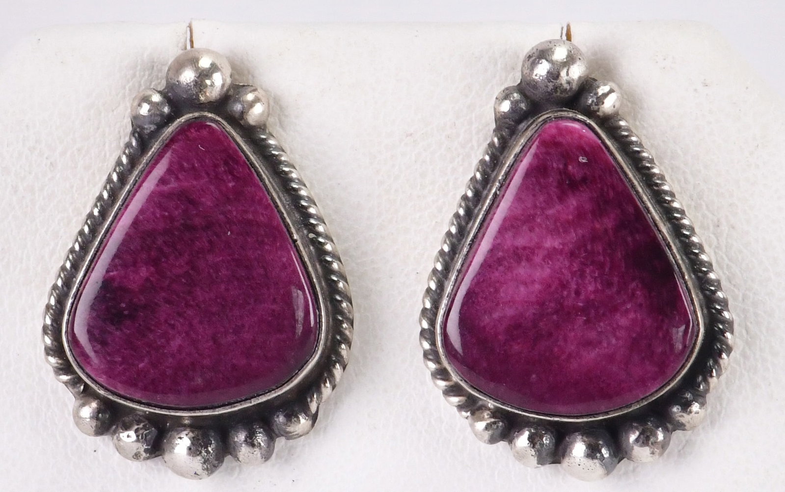 Elouise Kee Sterling Silver Purple Spiny Oyster Earrings: Sterling Silver| Elouise Kee Sterling Silver Purple Spiny Oyster Earrings| Genuine Spiny Oyster| Measure 1" Long x 3/4" Wide| Hallmarked "EK"| Weigh 10.9 Grams| Native American, Navajo, Southwestern I