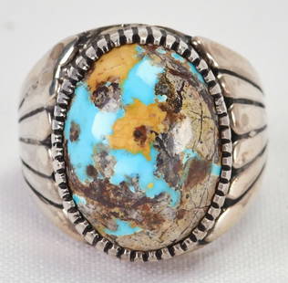 Native American Sterling Royston Turquoise Men's Ring: Sterling Silver| Native American Sterling Royston Turquoise Men's Ring w/domed stone| Genuine Royston Turquoise| Measures 1" Long x 3/4" Wide| Hallmarked "2"| Weighs 23 Grams| Size 10| Native American