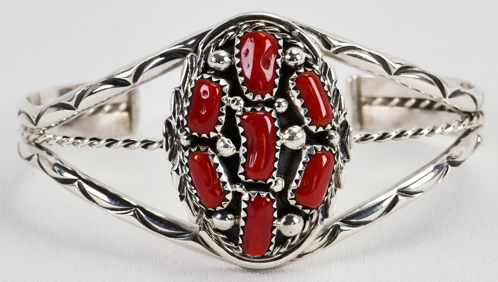 Melvin Chee Sterling Silver Coral Cluster Cuff w/Rain Drop Beads: Sterling Silver| Melvin Chee Sterling Silver Coral Cluster Cuff w/Rain Drop Beads| Genuine Coral| Inside measures 5.25" plus a gap of 1.25" - Total 7"| Signed| Weighs 22.6 Grams| Native American, Nava