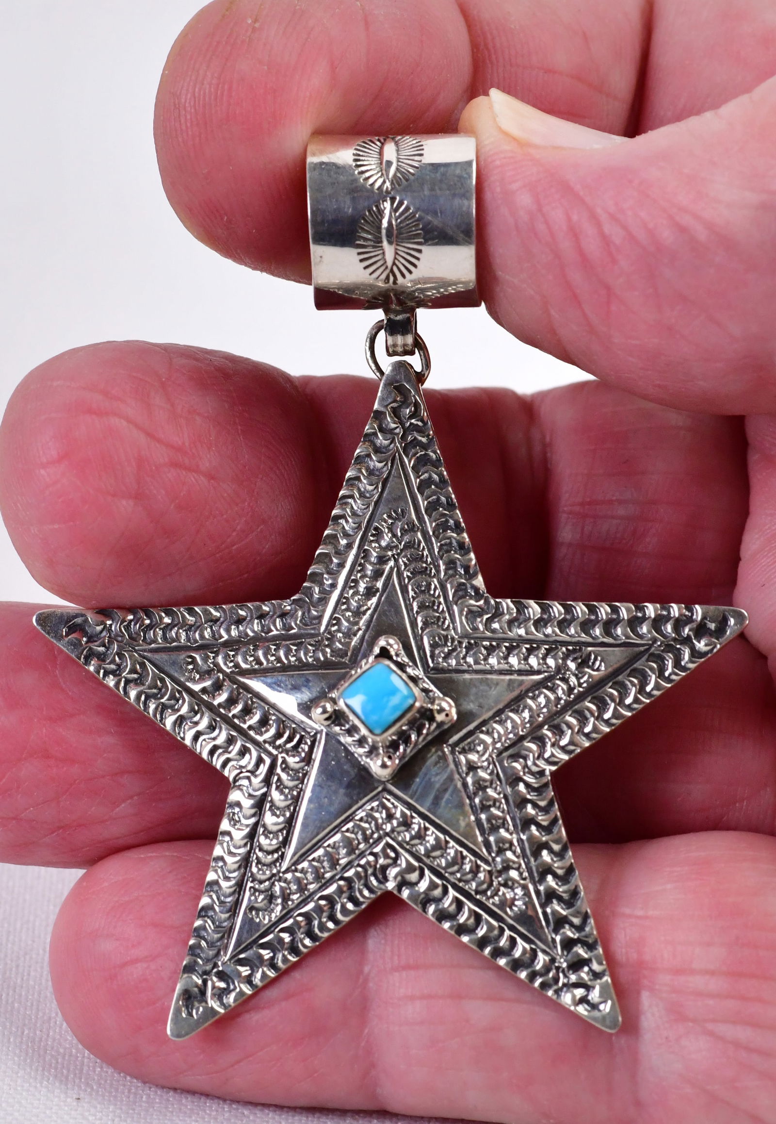 June Delgarito Sterling Silver Stamped Star Pendant W/Turquoise accent: Pendant Only - Sterling Silver| June Delgarito Sterling Silver Stamped Star Pendant w/Turquoise accent| Genuine Turquoise| Measures 2.75" Long x 2.25" Wide| Signed| Weighs 15 Grams| Native American, N