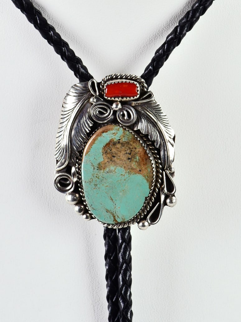 Mike Thomas Jr. Sterling Silver Royston Turquoise & Coral Bolo Tie: Sterling Silver| Mike Thomas, Jr. Sterling Silver Royston Turquoise & Coral Bolo Tie| Genuine Royston Turquoise, Genuine Coral| Measures approx. 42" Long - Slide Measures 2.25" Long x 1.75" Wide| Sign