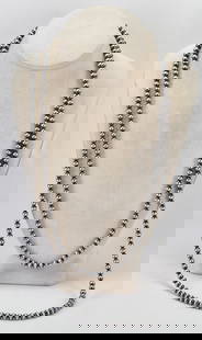60 Inch Native American Navajo Pearl Long Bead Necklace: Sterling Silver| Native American Sterling Silver Navajo Pearl Bead Necklace 60" Long| All Sterling Silver| Has 5 mm. beads and 60"| Unsigned| Weighs 65 Grams| Native American, Navajo, Southwestern Ind