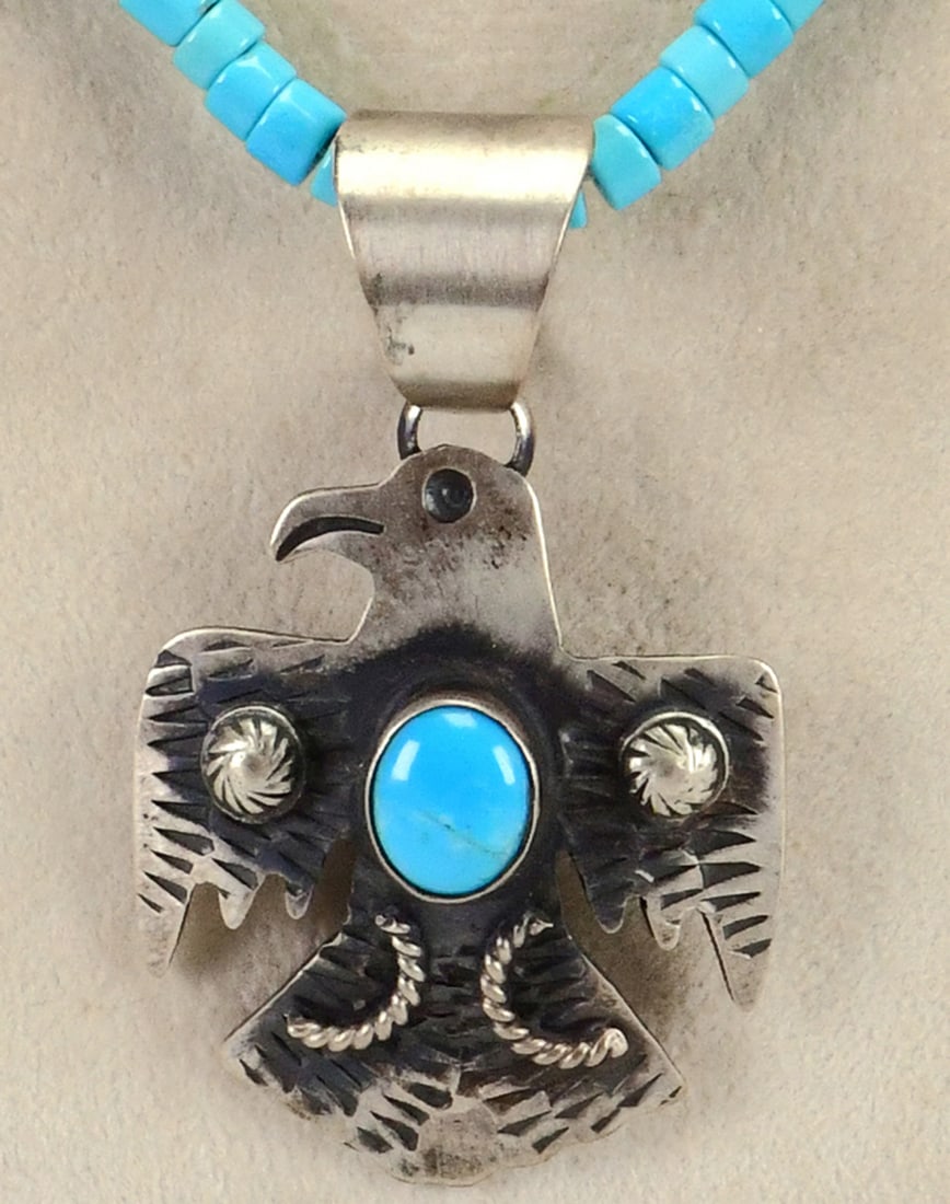 Chimney Butte Sterling Silver Thunderbird Pendant Necklace w/Turquoise: Sterling Silver| Chimney Butte Sterling Silver Thunderbird Pendant Necklace w/Turquoise| Genuine Turquoise| Chain is made of Natural Turquoise Tubular Beads and is 20" in Length| Pendant measures 2" T