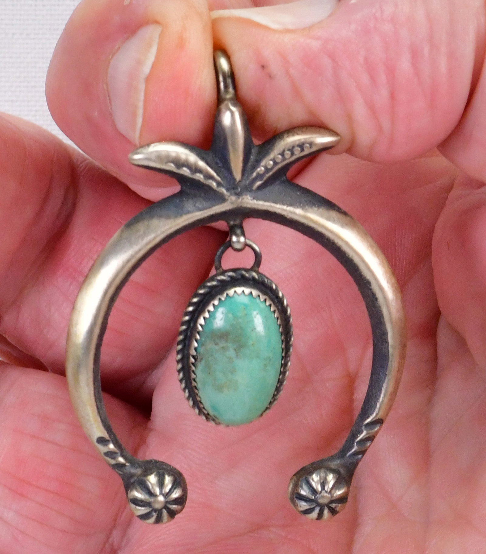 Native American Sterling Sand Cast Naja Pendant Necklace w/Turquoise: Sterling Silver| Native American Sterling Sand Cast Naja Pendant Necklace w/Turquoise| Genuine Nevada Green Turquoise| Chain measures 18" Long - Pendant measures 2" Tall x 1.5" Wide| Hallmarked "VC"| 
