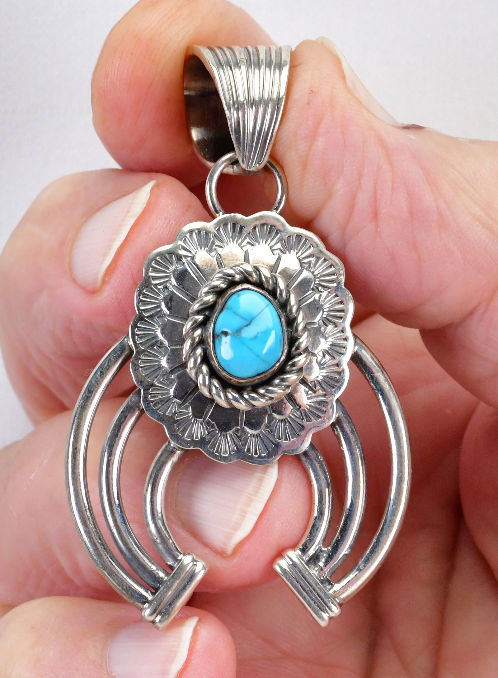 Limbert Perry Sterling Silver Naja Pendant w/Turquoise: Pendant Only - Sterling Silver| Limbert Perry Sterling Silver Naja Pendant w/Turquoise accent| Genuine Turquoise| Measures 2.75" Long x 1 5/8" Wide| Signed "L. Perry"| Weighs 21.8 Grams| Native Americ