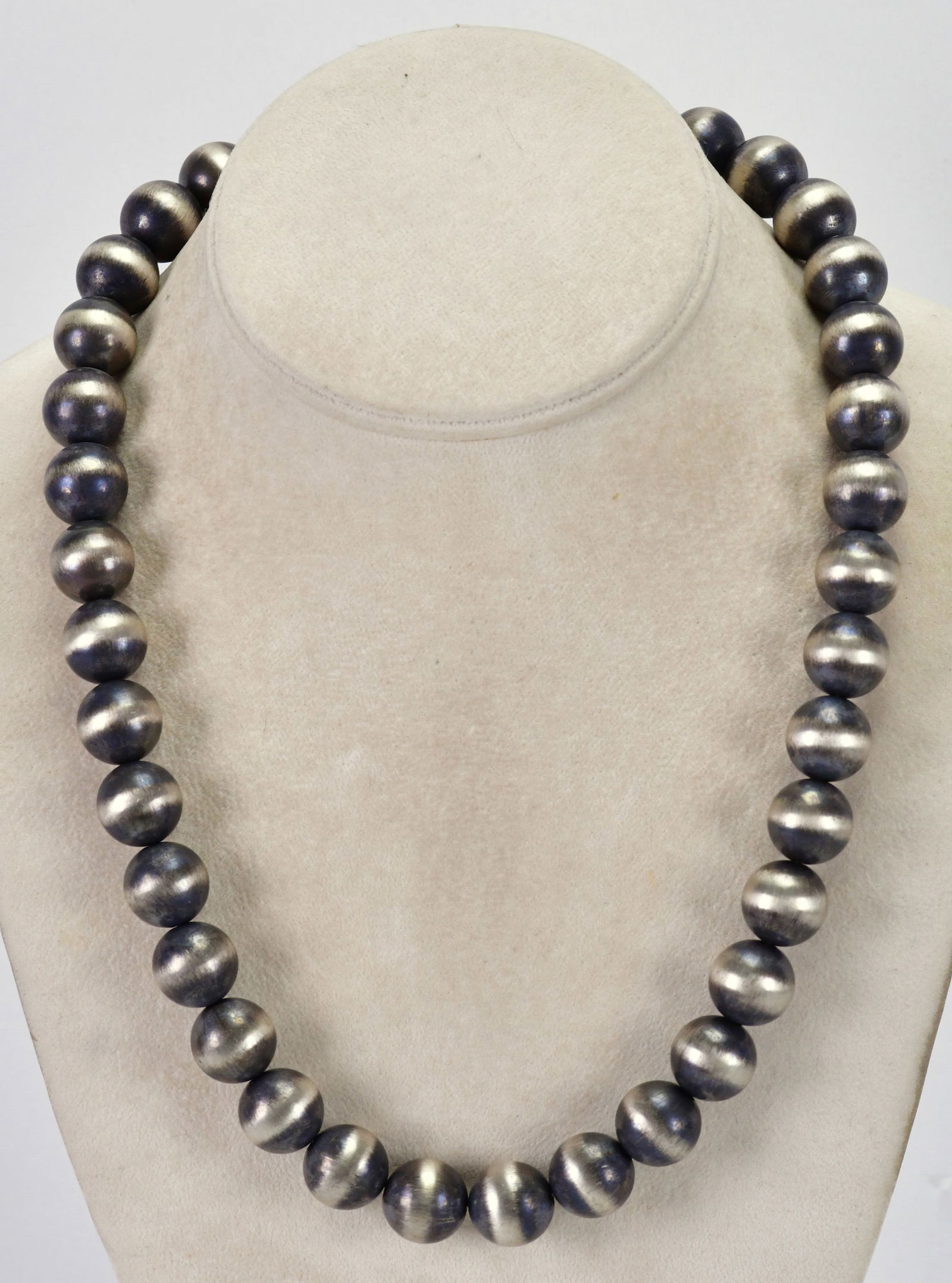 Michelle Jameson Handmade Sterling Bench Bead Navajo Pearl Necklace: Sterling Silver| Michelle Jameson Handmade Sterling Bench Bead Navajo Pearl Necklace| All Sterling| Measures 21" in Length| Each handmade Bead is approx. 14-15 mm| Unsigned| Has Large Sterling Hook Cl