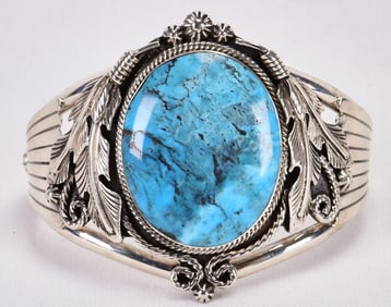 Loretta Delgarito Sterling Silver Red Mountain Turquoise Cuff w/Feather detail