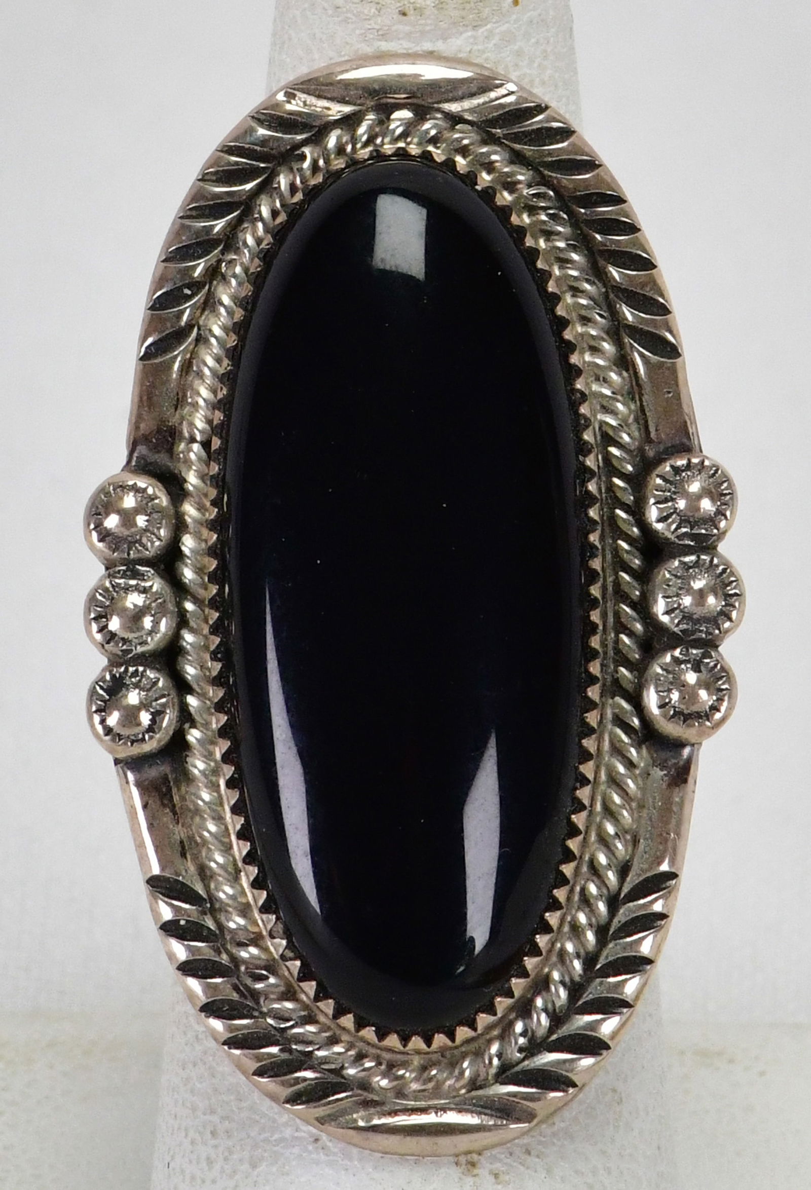 Native American Sterling Silver Black Onyx Oblong Ring - Size 7: Sterling Silver| Native American Sterling Silver Black Onyx Oblong Ring| Genuine Black Onyx| Measures 1.75" Long x 1" Wide| Has Rope and Bead Frame| Hallmarked "PY"| Weighs 17.4 Grams| Size 7 or 7.25