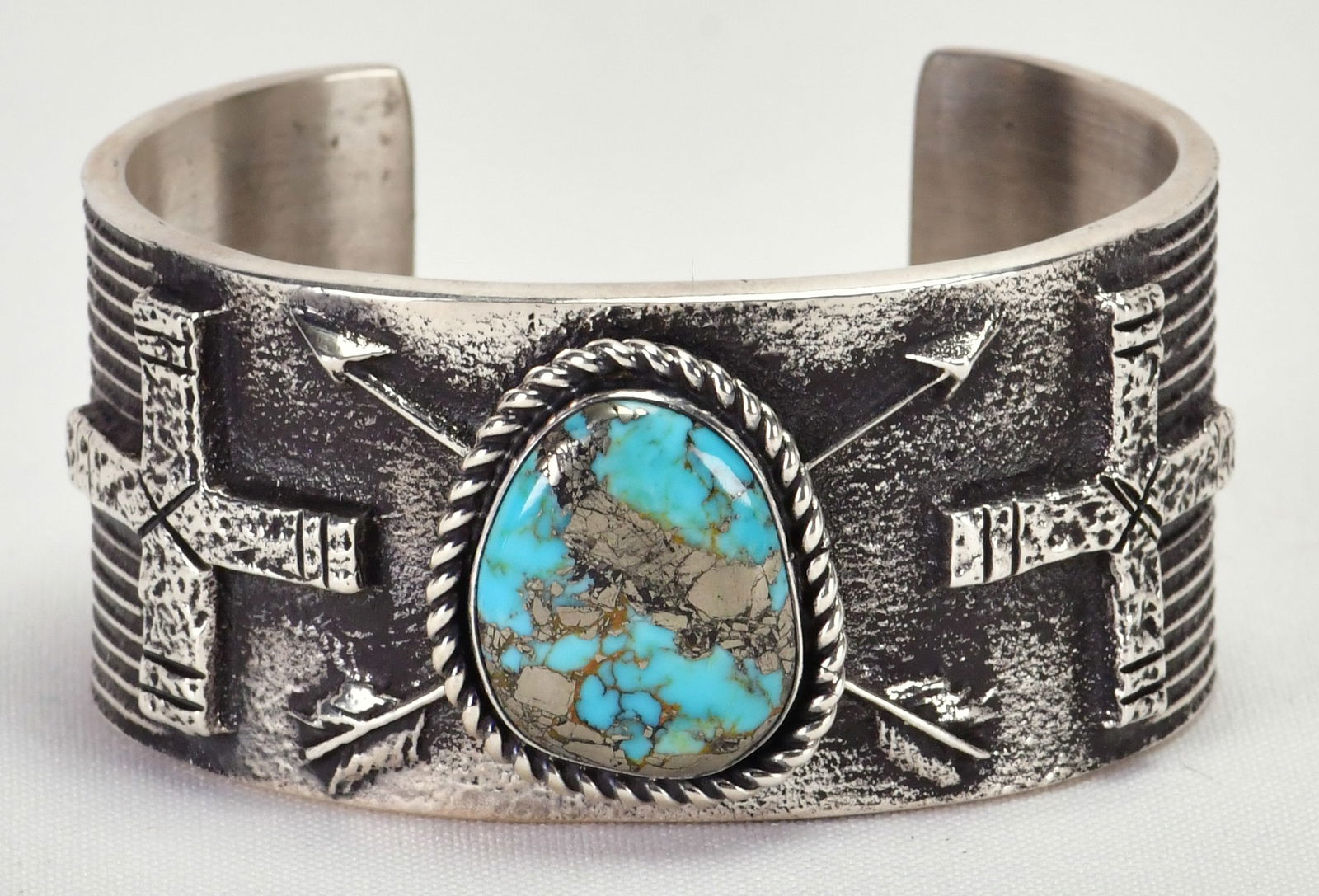 Aaron Anderson Sterling Silver Tufa Cast Bracelet with Stormy Mountain Turquoise: Sterling Silver| Aaron Anderson Sterling Silver Tufa Cast Bracelet w/Stormy Mountain Turquoise| This Artist is known for his One of a Kind Award Winning Pieces| Genuine Stormy Mountain Turquoise| Insi