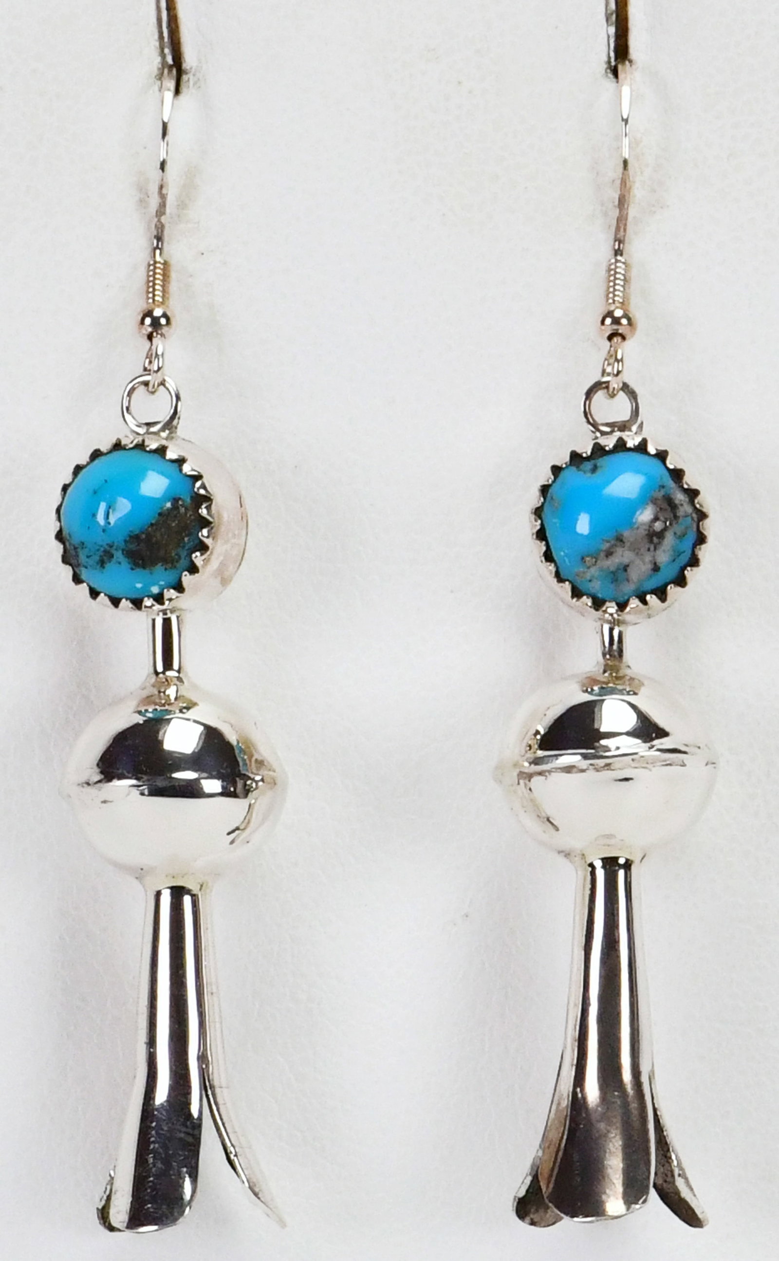 Native American Sterling Kingman Turquoise Squash Blossom Earrings w/Turquoise: Sterling Silver| Native American Sterling Kingman Turquoise Squash Blossom Earrings w/Turquoise Accent| Genuine Kingman Turquoise| Measures 2.5" Long x 1/2" Wide| Unsigned but made by "Tsosie"| Weigh
