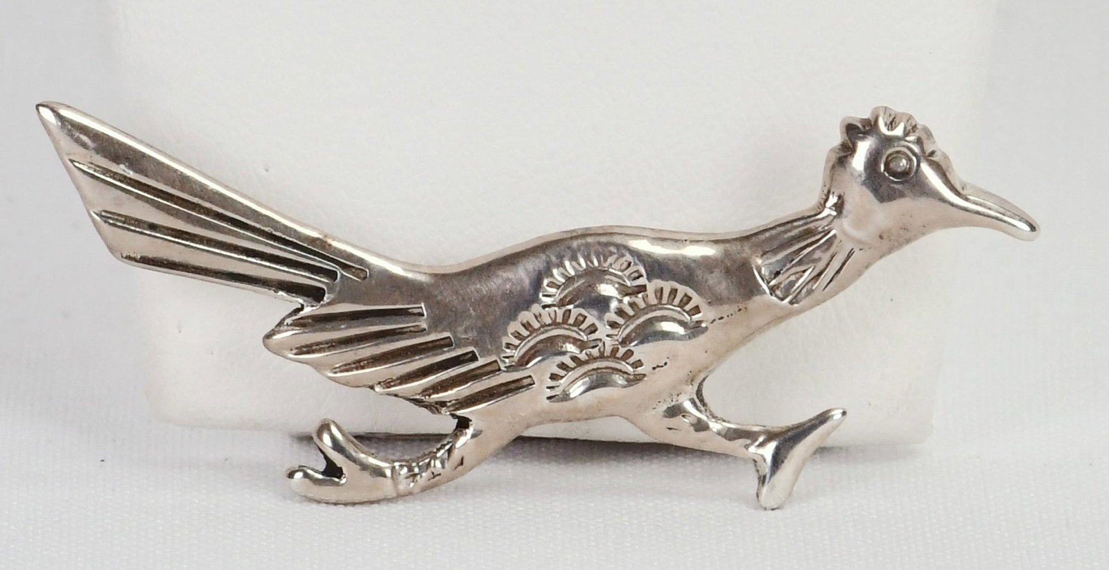 Native American Sterling Silver Roadrunner Pin: Sterling Silver| Native American Sterling Silver Road Runner Pin| All Sterling Silver| Measures 2.25" Wide x 1" Tall| Has Pin Clasp On Back| Hallmarked "AM"| Weighs 8.3 Grams| Native American, Navajo,